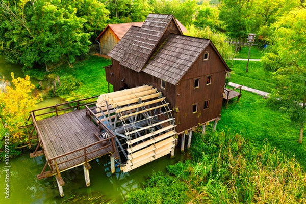 Fototapeta Aerial view of a historical watermill on Small Danube (Jelka, Slovakia)