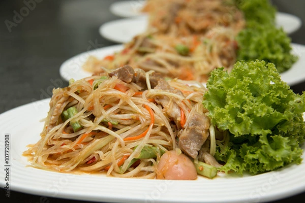 Obraz Thai Spicy papaya salad on plate