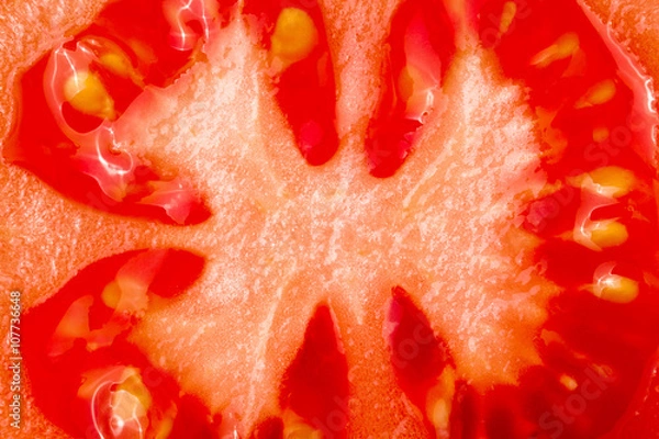 Fototapeta section of tomato as a background close-up macro