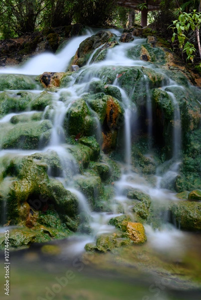 Fototapeta Soa Hot Spring Waterfall in Mangeruda, Flores, Indonesia with Thermal Water Flowing over Rocks