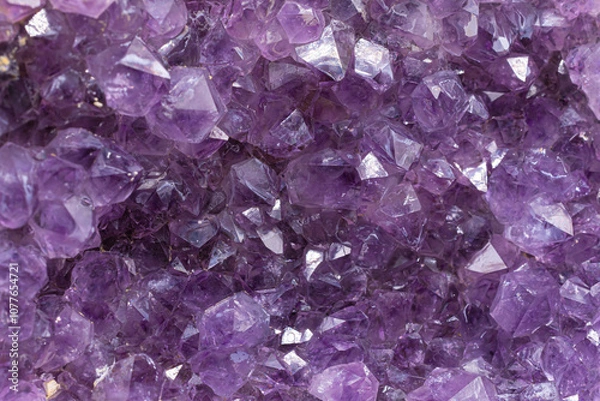 Fototapeta An abstract image of the sparkling texture of an amethyst geode crystal
