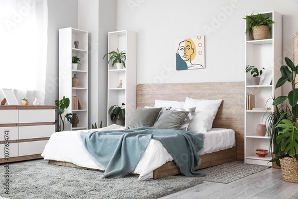 Fototapeta Interior of stylish bedroom with houseplants