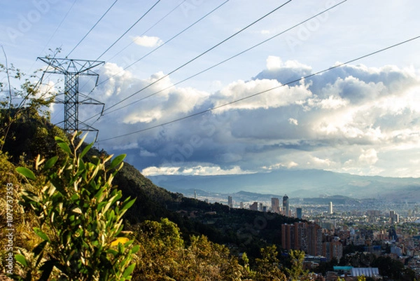 Obraz High angle view of Bogota city landscape with electricity tower at sunset, view from mountains