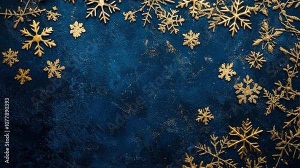 Fototapeta A classic holiday card with a refined gold snowflake design on a deep blue background, with open space in the center for text.