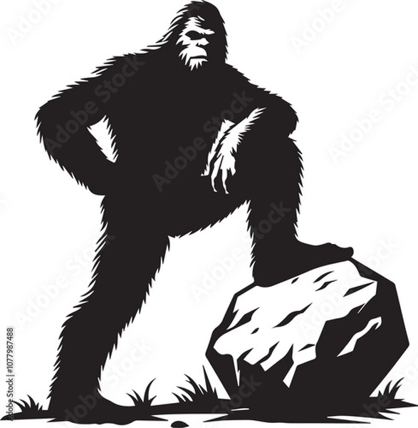 Fototapeta Bigfoot silhouette posing with a large boulder