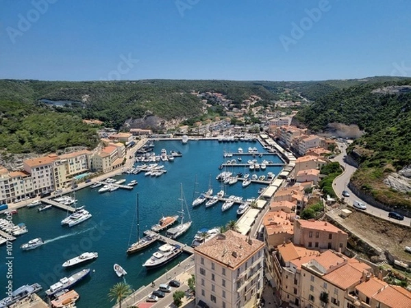 Obraz a view of the harbour from the cliff town in bonifacio, corsica