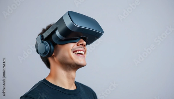 Fototapeta Virtual reality experience, modern technology, immersive entertainment A young man wearing a white VR headset