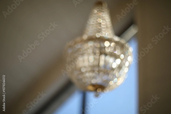 Fototapeta Texture, pattern, background. light crystal chandelier with blurred focus. Glamour background with copy space.