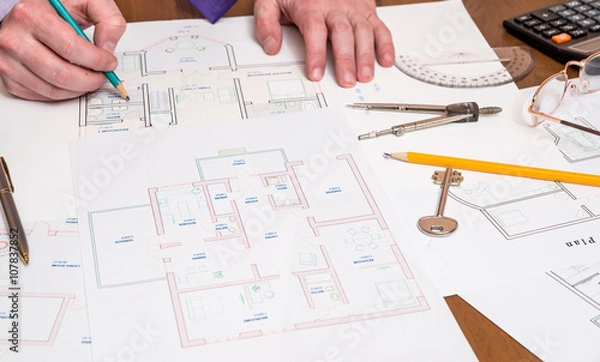 Obraz Architect working on blueprint