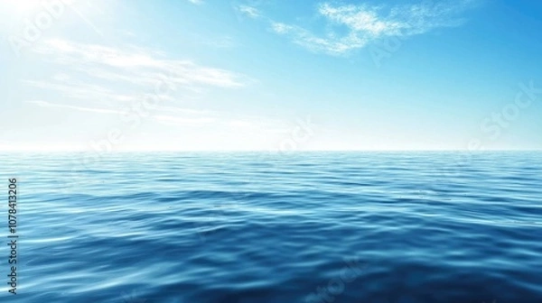 Obraz Vast expanse of blue ocean water on a sunny day with clear horizon and white clouds in sky.