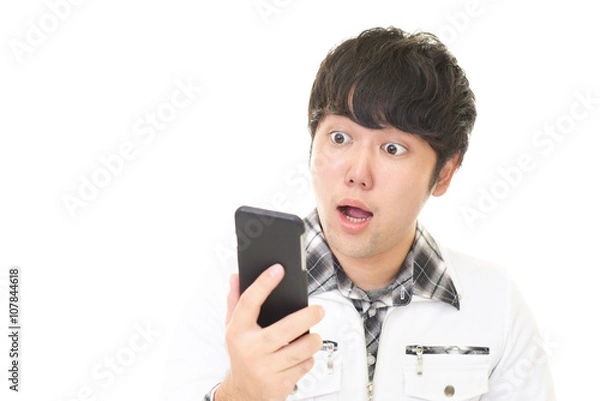 Fototapeta 驚いた表情の青年