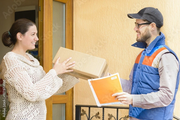 Obraz Courier Delivering a Package