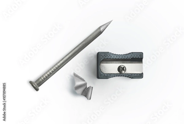 Fototapeta Nail and sharpener on a white background. Creative concept