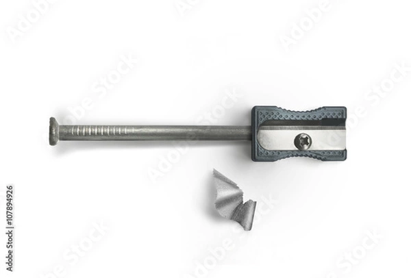 Fototapeta Nail and sharpener on a white background. Creative concept