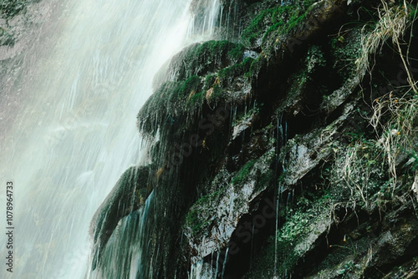 Obraz Mountain waterfall with green moss on the rocks