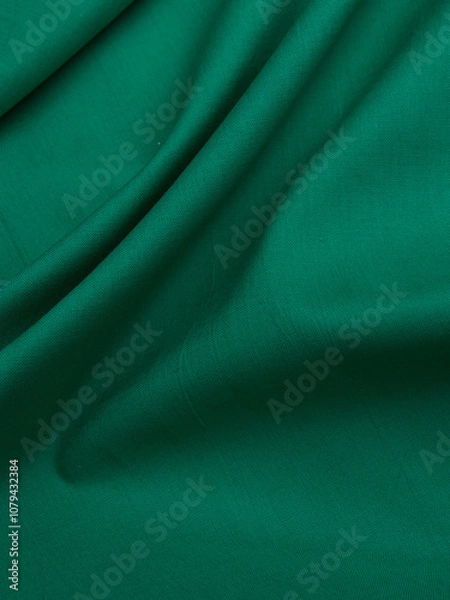 Fototapeta Background - new green linen fabric. High-quality texture of expensive fabric.