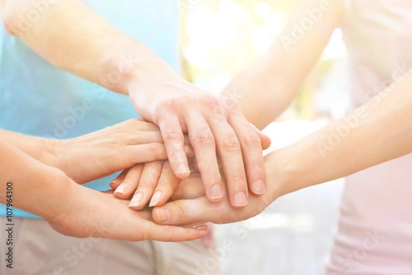 Fototapeta United hands outdoors