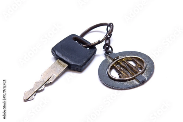 Fototapeta a rusty motorcycle key on a white background