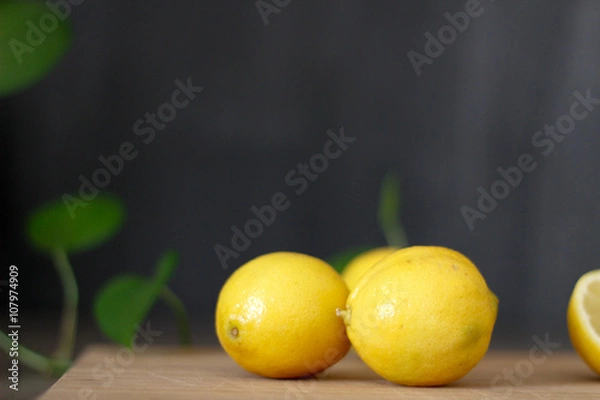 Fototapeta Lemons in a dish with a simple background