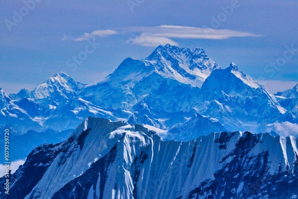 Fototapeta Majestic Mount Kanchenjunga,8586 m,viewed from Mera Peak Central Summit,over 126 kms away on India border with its 5 summits and Mount Jannu,7710 m,bright October morning,Mera Peak Expedition,Nepal 