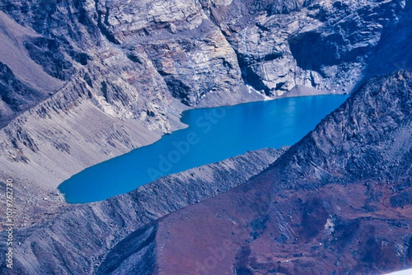 Fototapeta Azure blue Glacial meltpool formed at the base of the icefall of Mount Makalu from the summit of Mera Peak central,6461 m,Mera Peak expedition,Nepal 