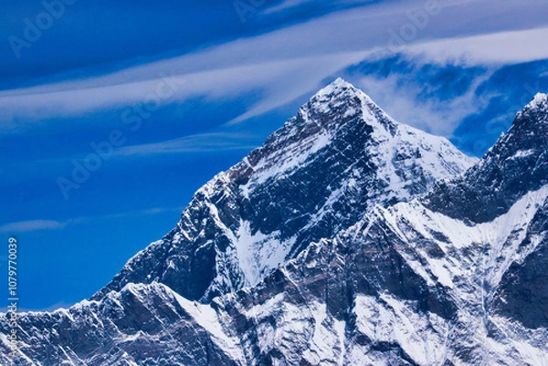 Fototapeta Mount Everest Summit,8848 m,highest point on Earth,rising above the serrated edge of the Nuptse ridge,seen from the Mera Peak Central summit,6461 m,Mera Peak expedition,Himalayas,Nepal 