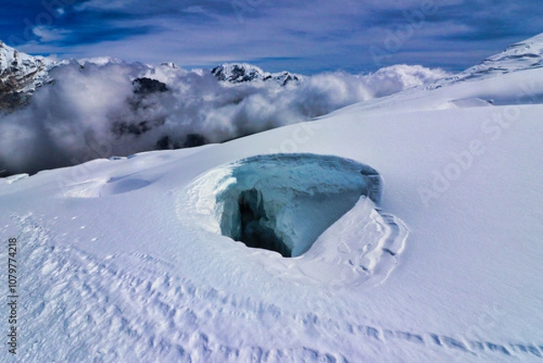 Fototapeta A huge crevasse on the northern snow fields of the upper Mera glacier during the descent from the summit to high camp of Mera Peak,Nepal 