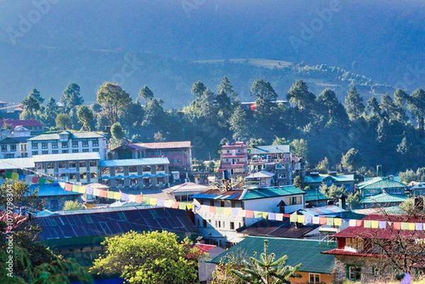 Fototapeta Picturesque view of Lukla town with its many tea houses,lodges and Hillary-Tenzing Airport, the base for all major himalayan expeditions to Everest and other great peaks,Lukla,Nepal 