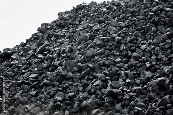Fototapeta Heap of coal. A place, where coal is stored for selling.
