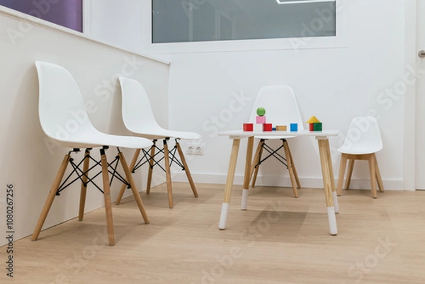 Fototapeta Modern waiting room designed for children with toys on table