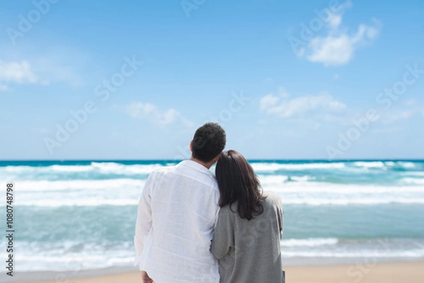 Obraz 海を見つめるカップルの後姿