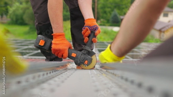 Fototapeta Slow motion of construction worker cutting steel beam. Man works circular saw. Flies of spark from hot metal. Man worked over the steel. close-up of hand and electric saws metal. Close-up of hand too.