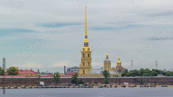 Fototapeta Peter and Paul Fortress across the Neva river timelapse hyperlapse, St. Petersburg, Russia