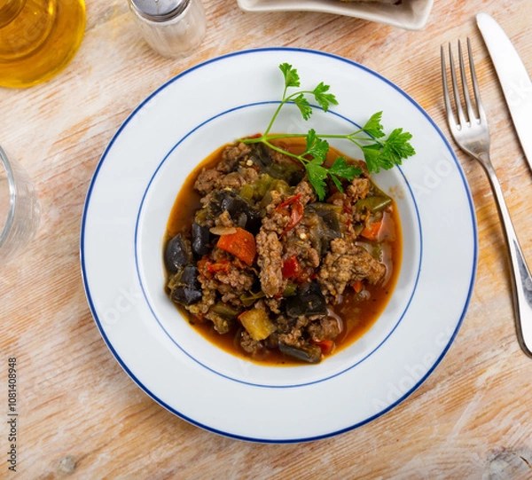 Fototapeta Delicious vegetable stew with minced meat served on platter