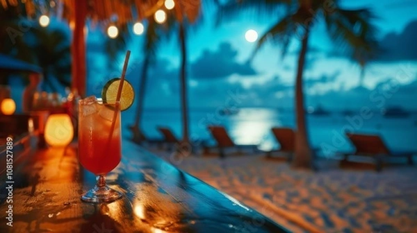 Fototapeta Close-up of a cocktail bar serving tropical drinks to partygoers on a moonlit beach