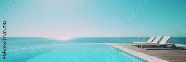 Fototapeta Infinity Pool Overlooking the Ocean: A Luxurious Getaway