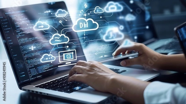 Fototapeta A person using a laptop with cloud computing graphics and data visualization.