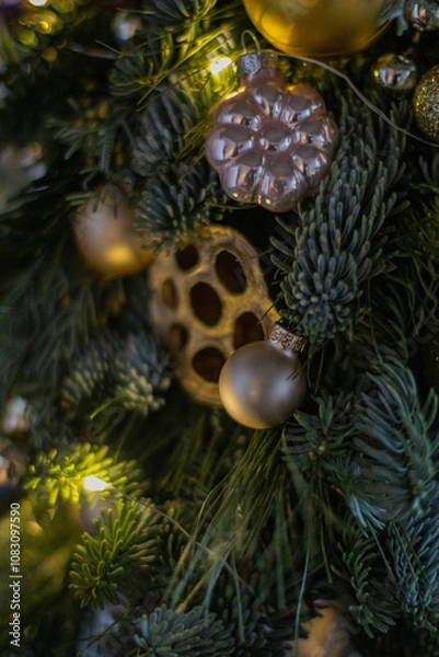 Obraz A gift version of the small Christmas tree. Natural nobilis. Gold balls. Christmas tree Handmade. New year. Ideal decoration article for office and home tables.
