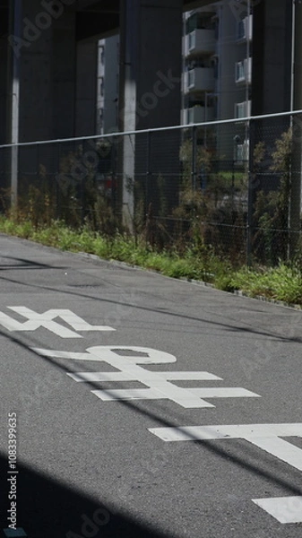 Fototapeta Japanese crossroads signs with stop signs in Japanese