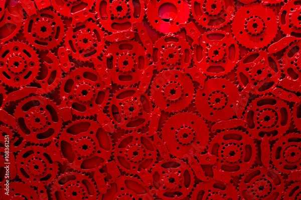 Obraz cogs gears in motion red background team work connected technology