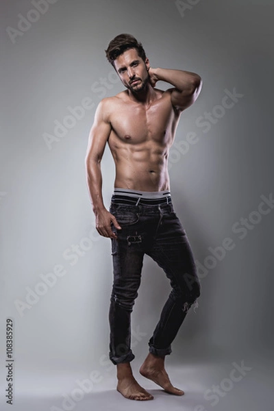 Fototapeta Shirtless man posing seriously
