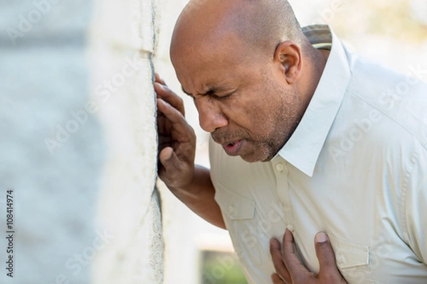 Obraz Man having a heart attack.