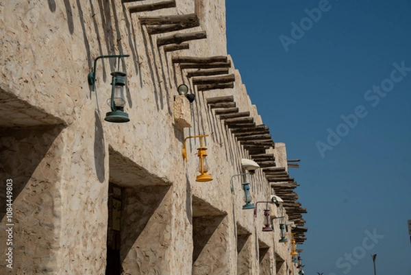 Fototapeta Souq Waqif in Doha, Qatar, is a vibrant and historic market known for its traditional Qatari architecture and bustling atmosphere.
