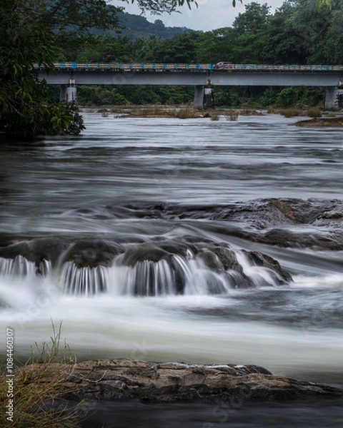 Obraz Beautiful view of water flow from Ezhattumugham prakriti gramam, Thumboormuzhi, Kerala India.