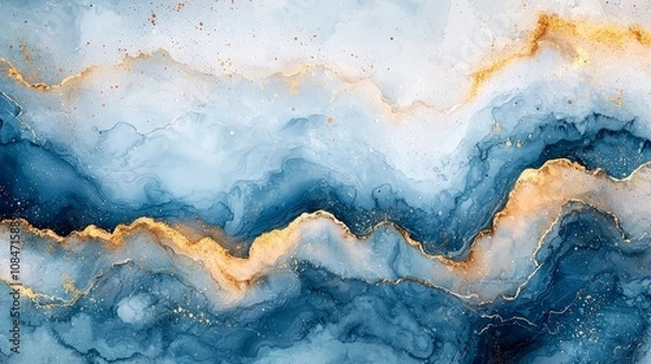 Fototapeta Abstract blue and gold marbled design with fluid patterns and textures.