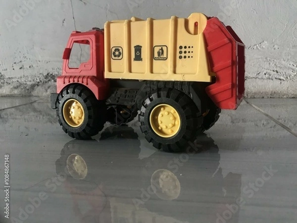 Fototapeta Toy Garbage Truck Isolated on White with reflek photo