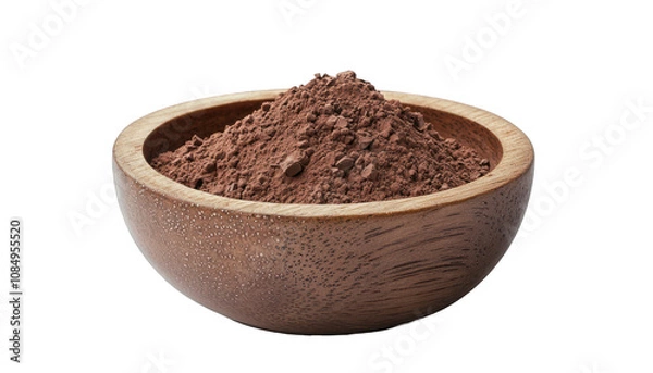 Fototapeta Fine cocoa powder contained in a wooden bowl, resting on a white background.