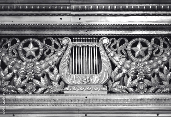 Fototapeta Beautiful forged ornament of metal fencing