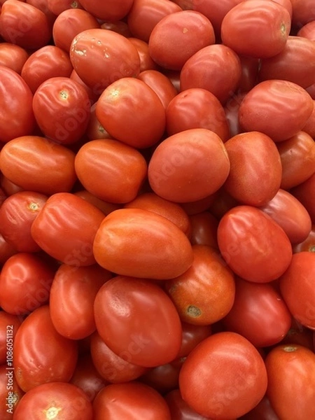 Obraz bright red, fresh tomatoes on the market