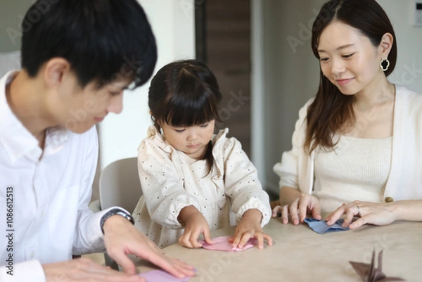 Fototapeta 折り紙を折る親子